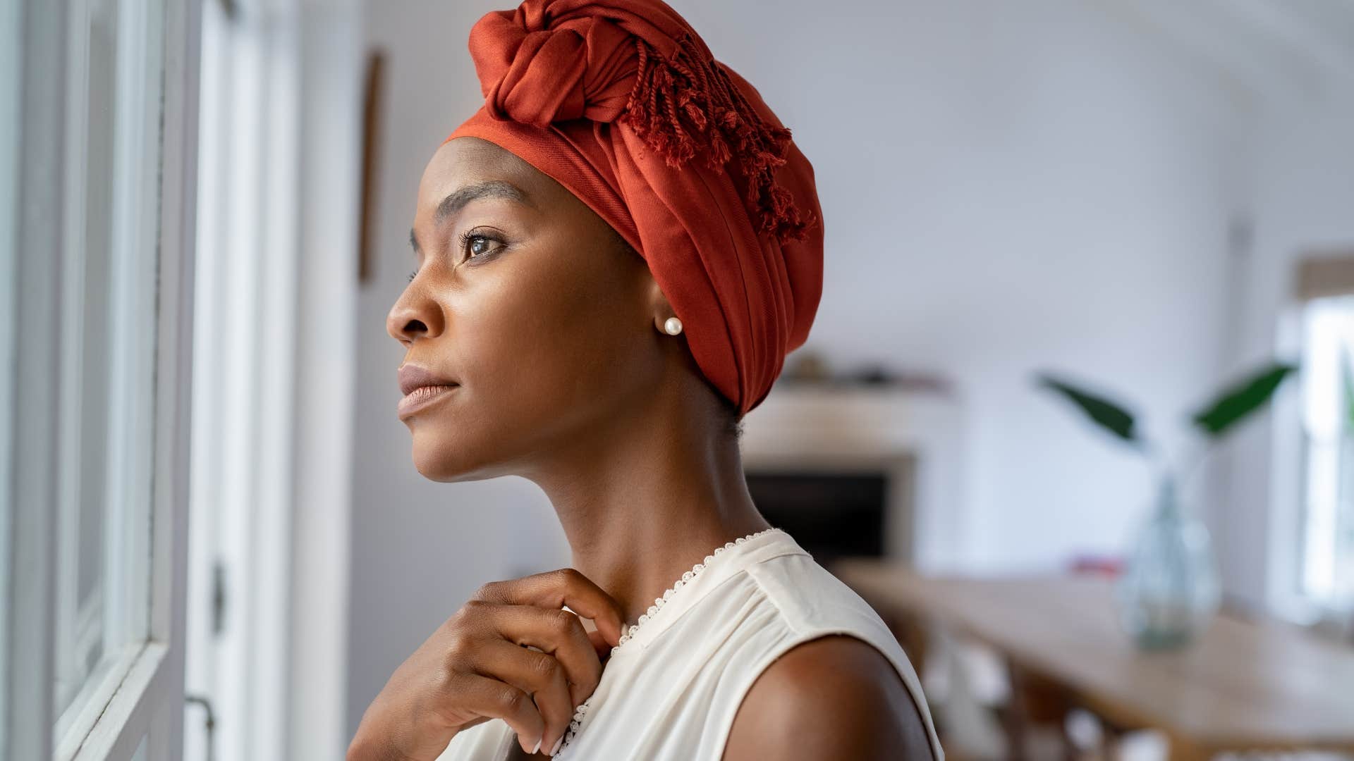 unheard woman looking sad staring outside