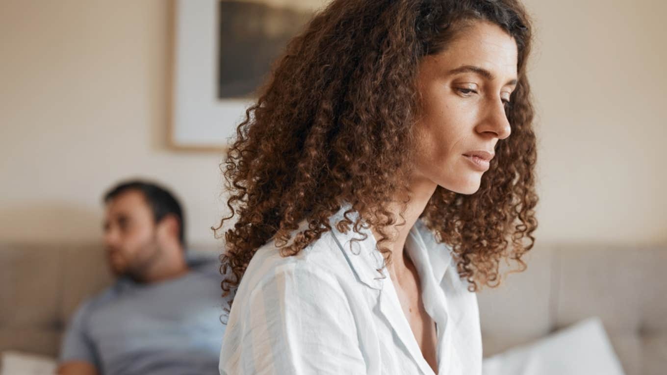 woman feeling emotionally drained by a weak man