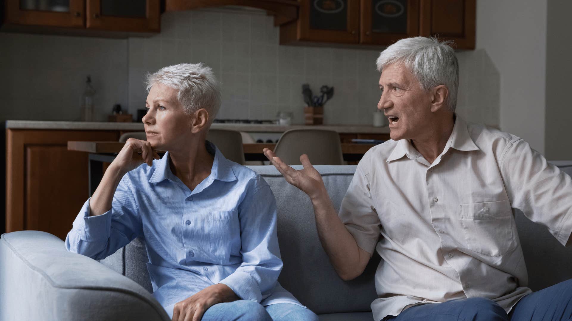 upset angry man talking to woman