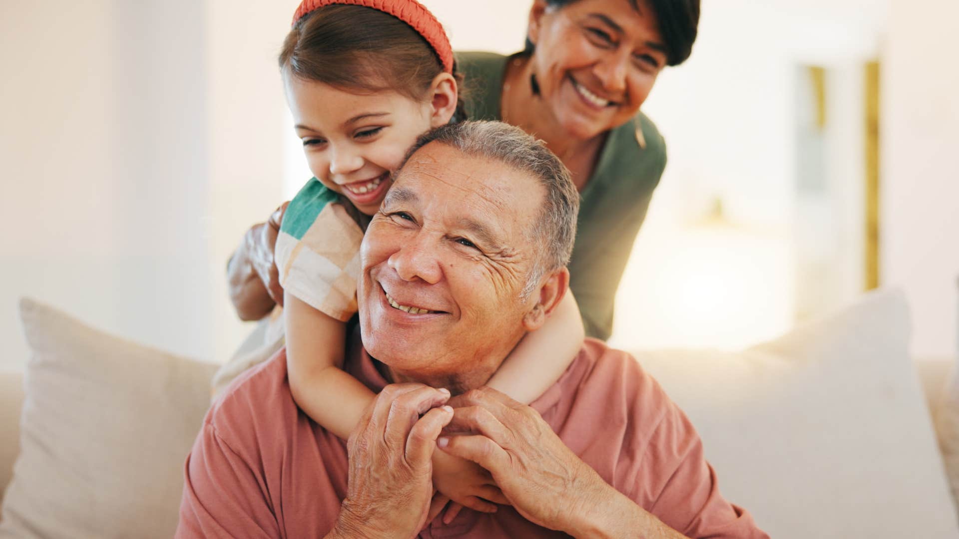 grandfather babysitting his grandchild