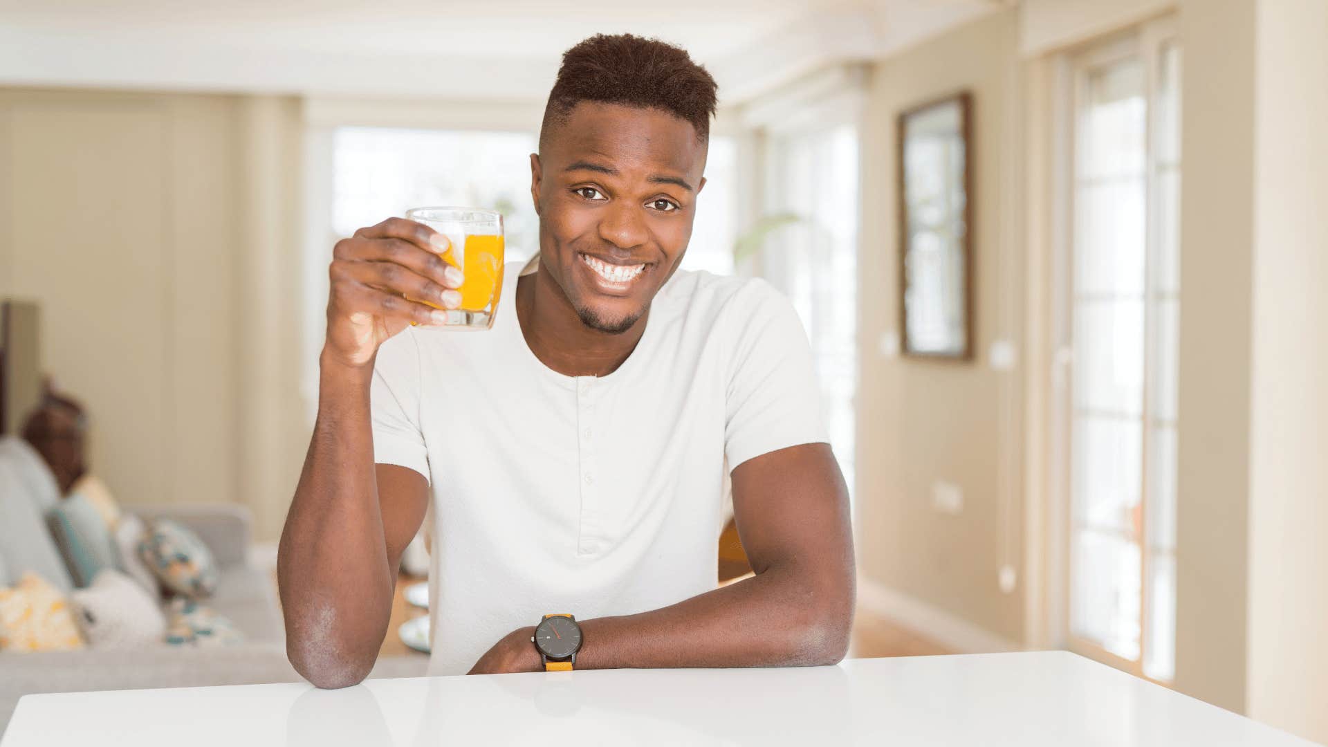 man drinking juice