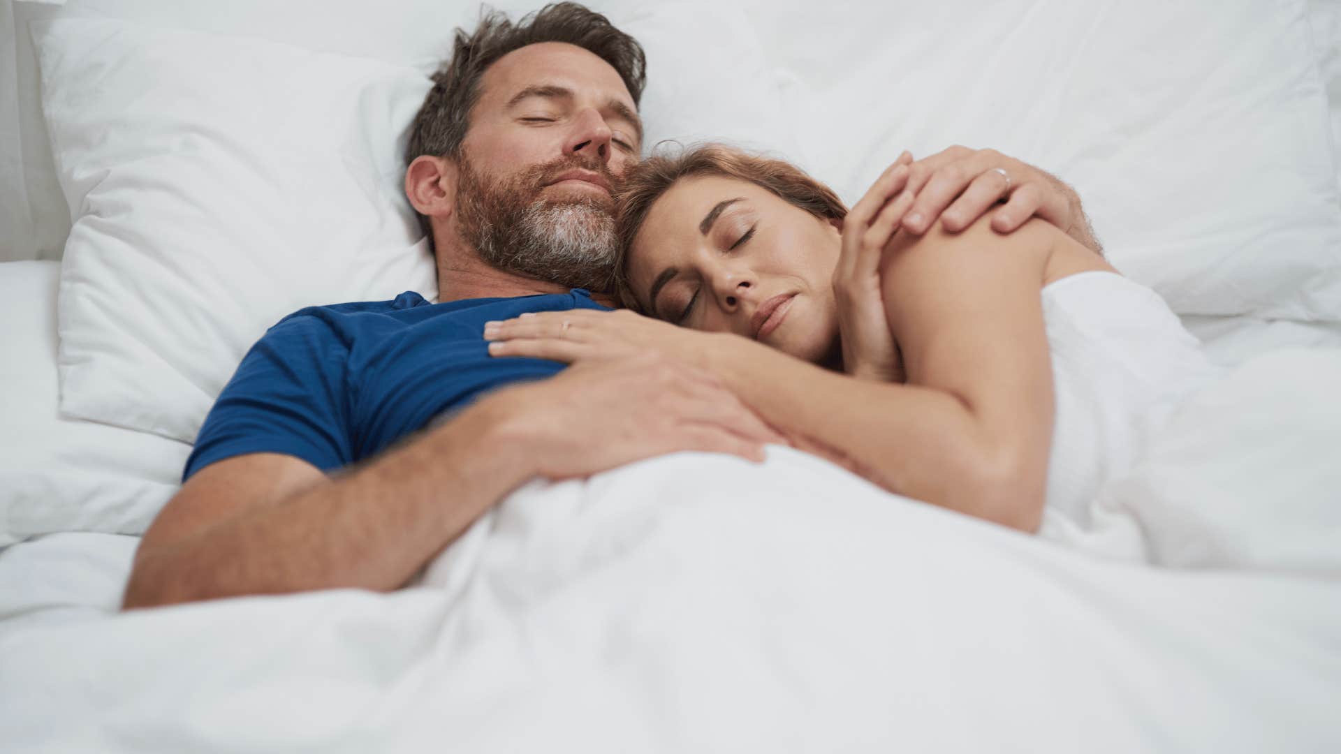 couple sleeping in bed