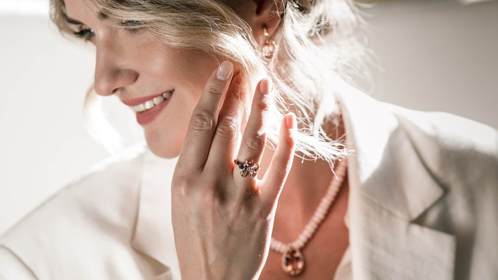 woman with diamond ring on finger