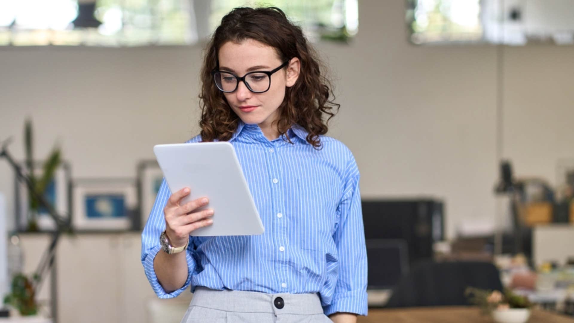 employee looking at tablet