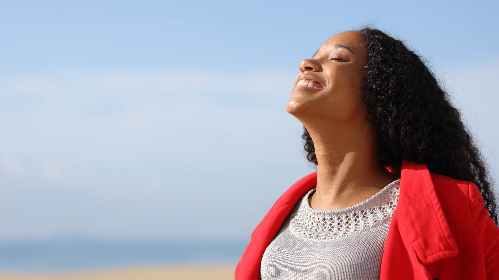 Happy woman enjoys time alone