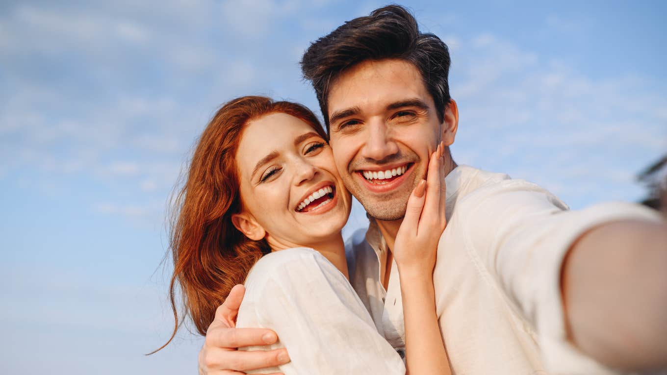 loving couple husband holding wife smiling