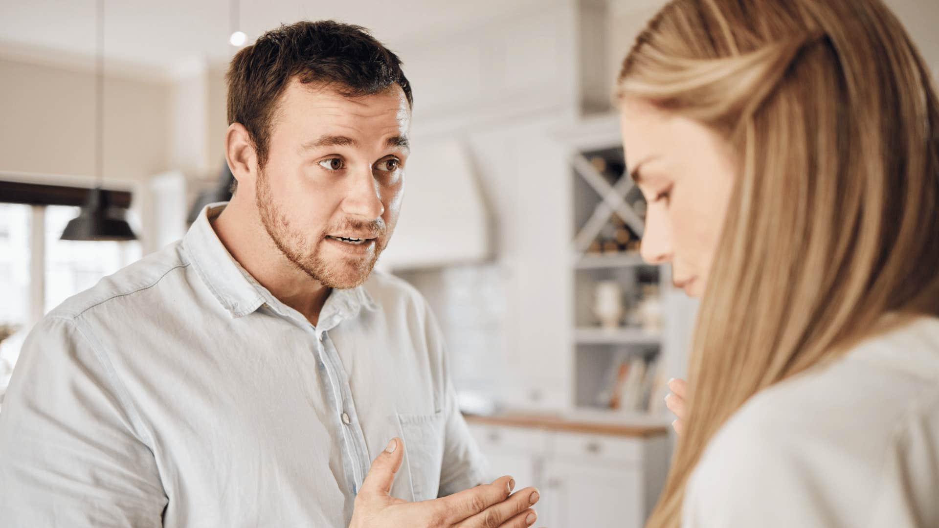 man trying hard to communicate with wife