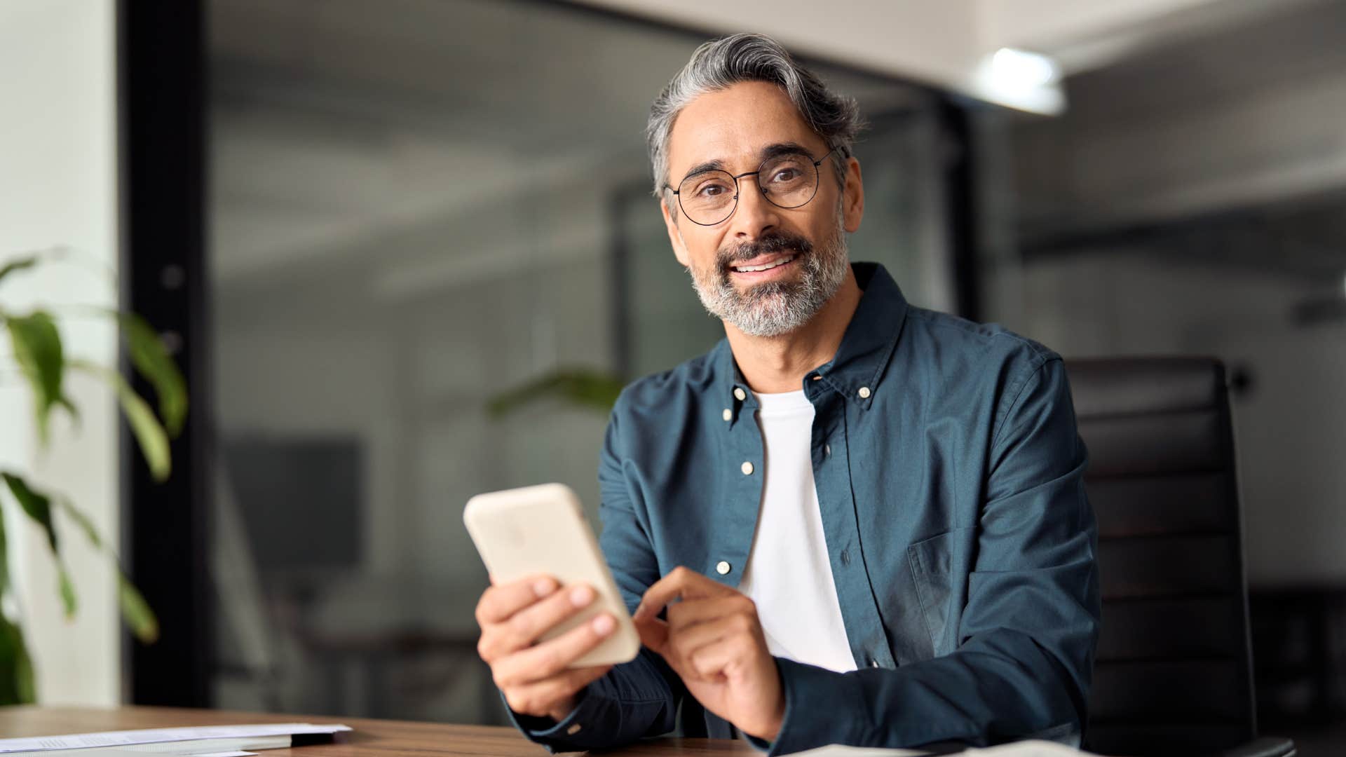 man using cryptocurrency on his phone