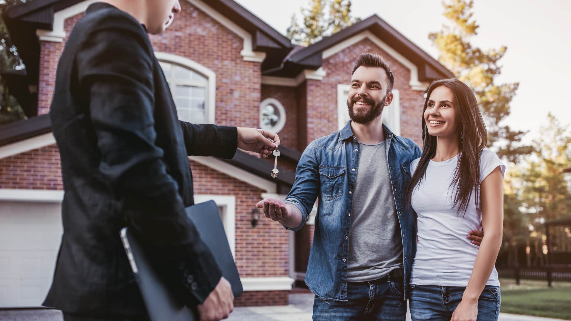 middle class couple taking on new home ownership