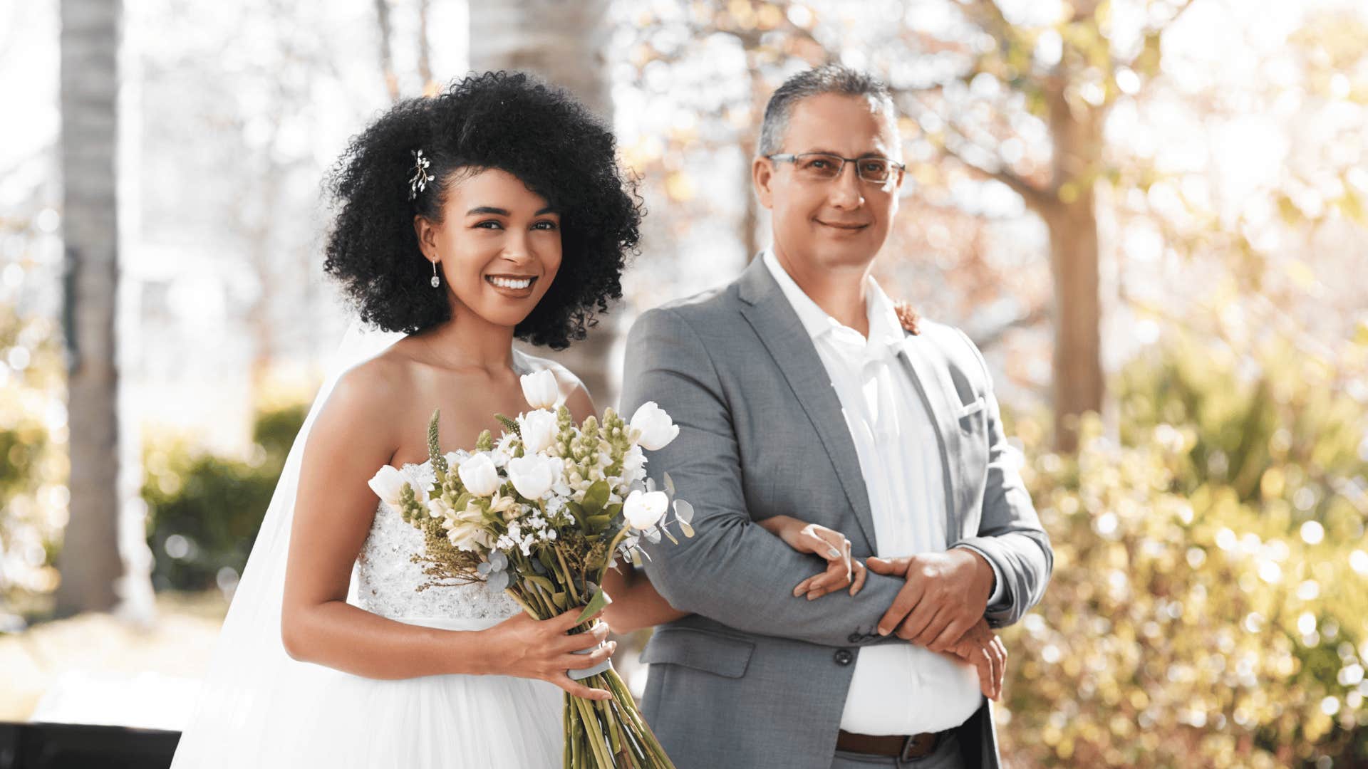 dad walking daughter down the aisle at her wedding