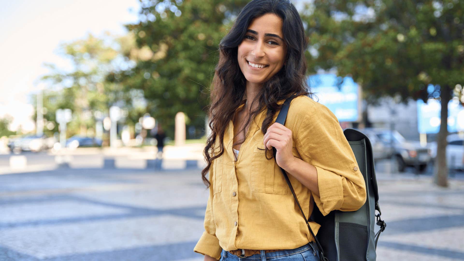 woman in casual clothes walking to work