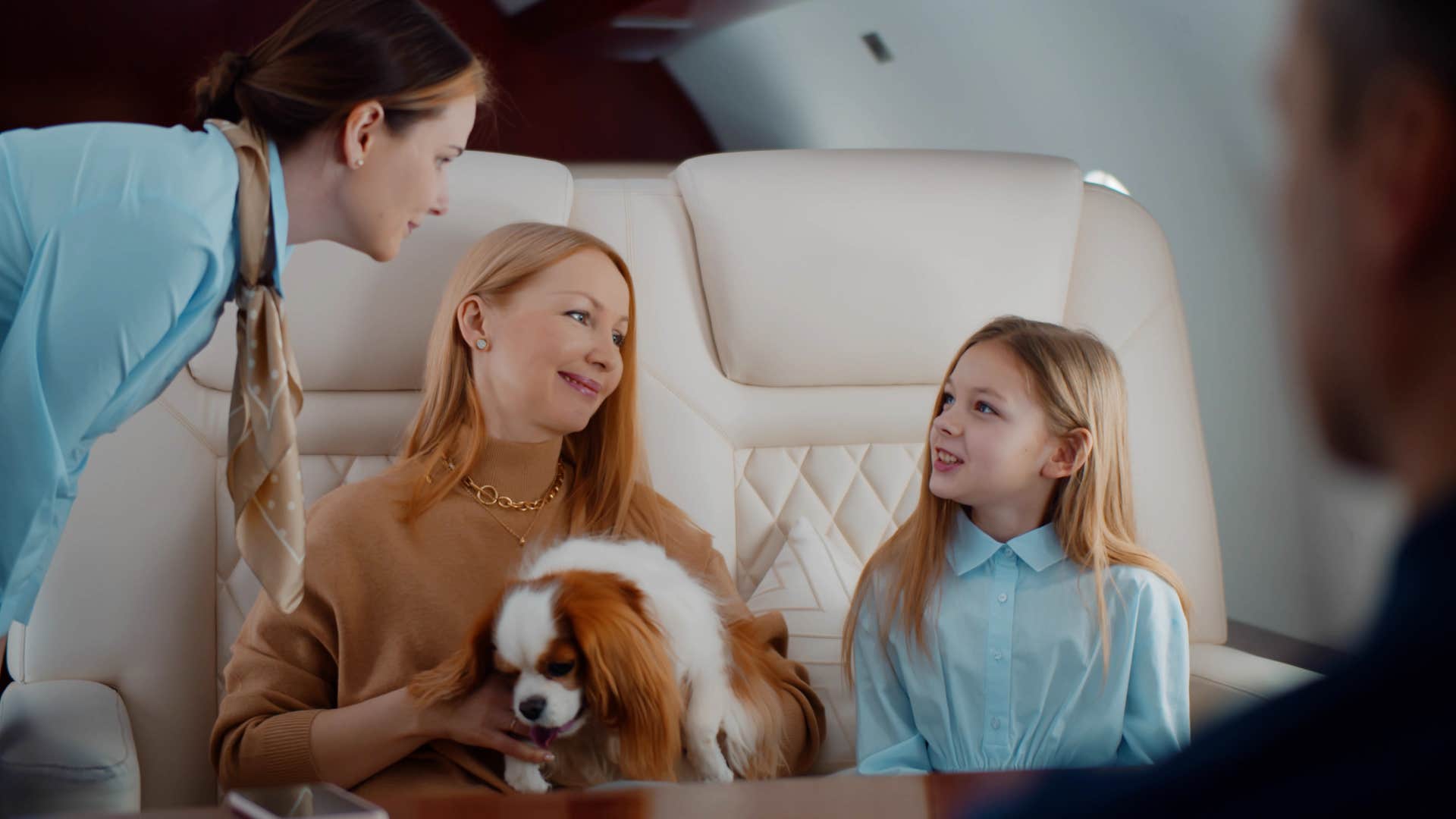 mom and daughter on private jet