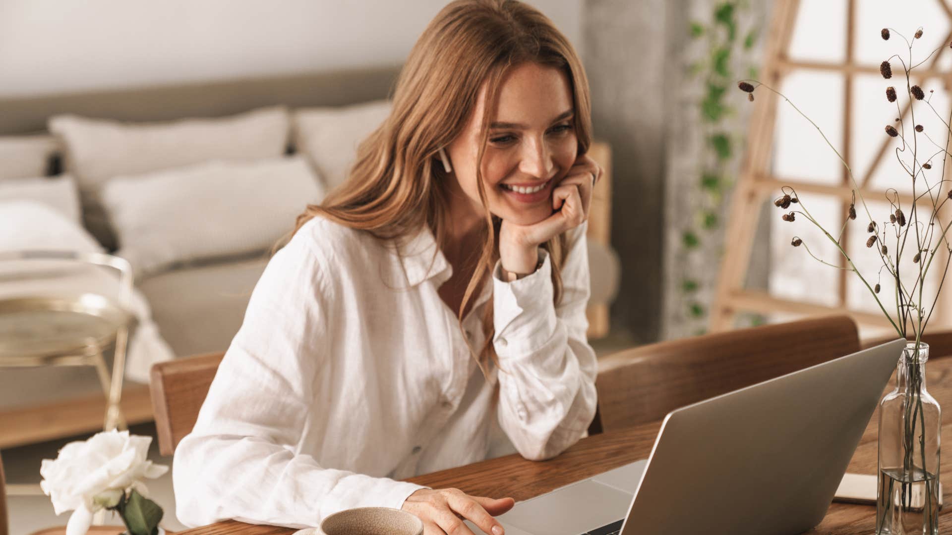 woman on her computer in her home office