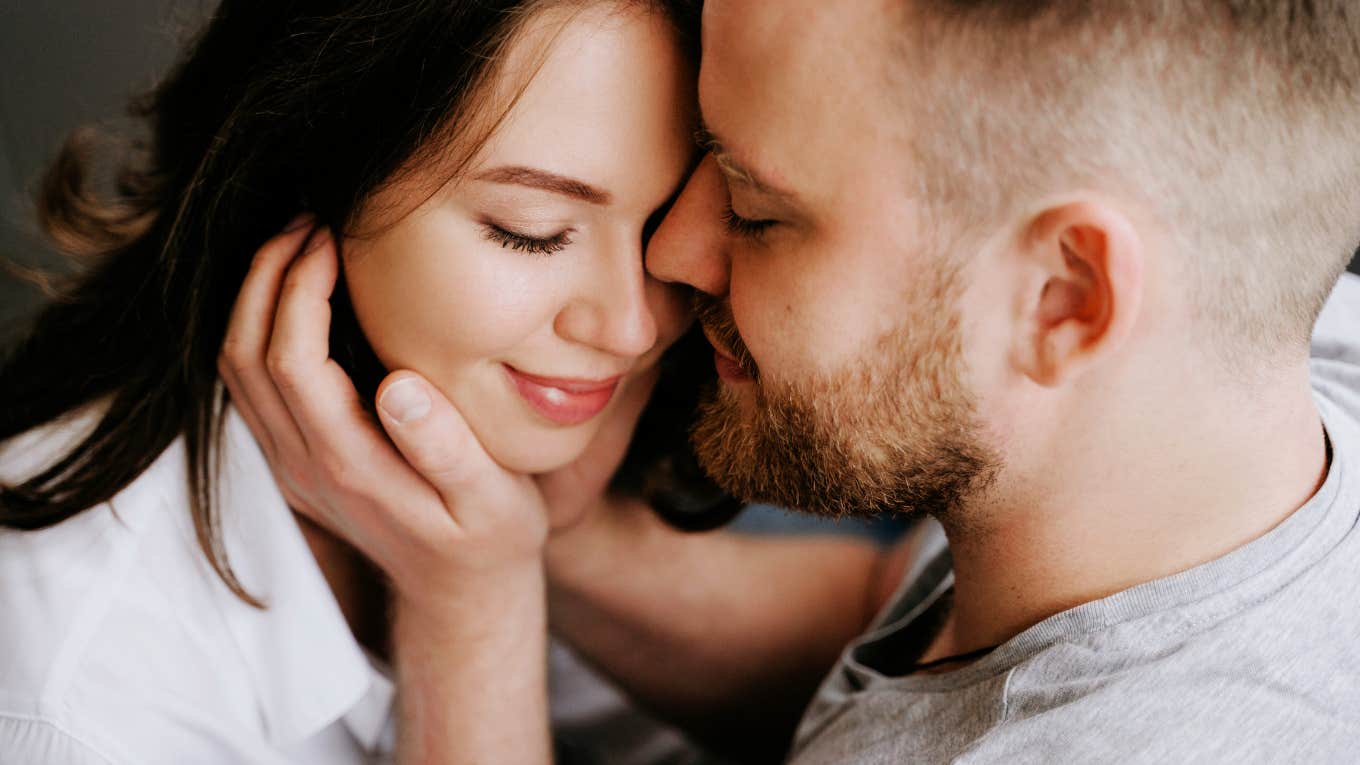 Woman embracing connection from her partner. 