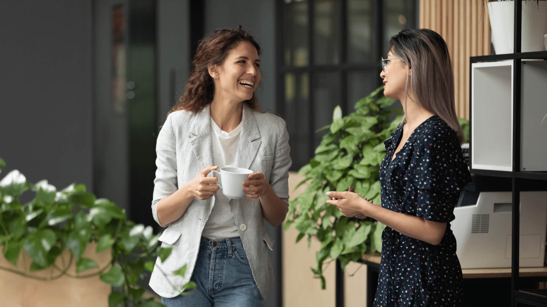 women talking and laughing