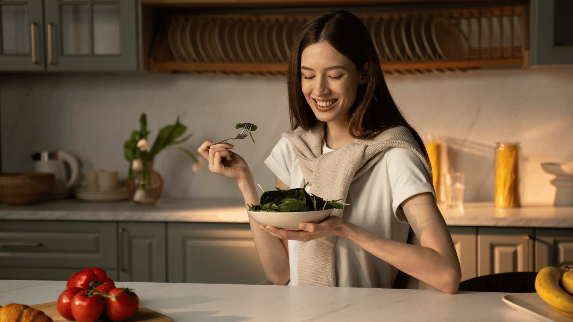 woman eating vegetables