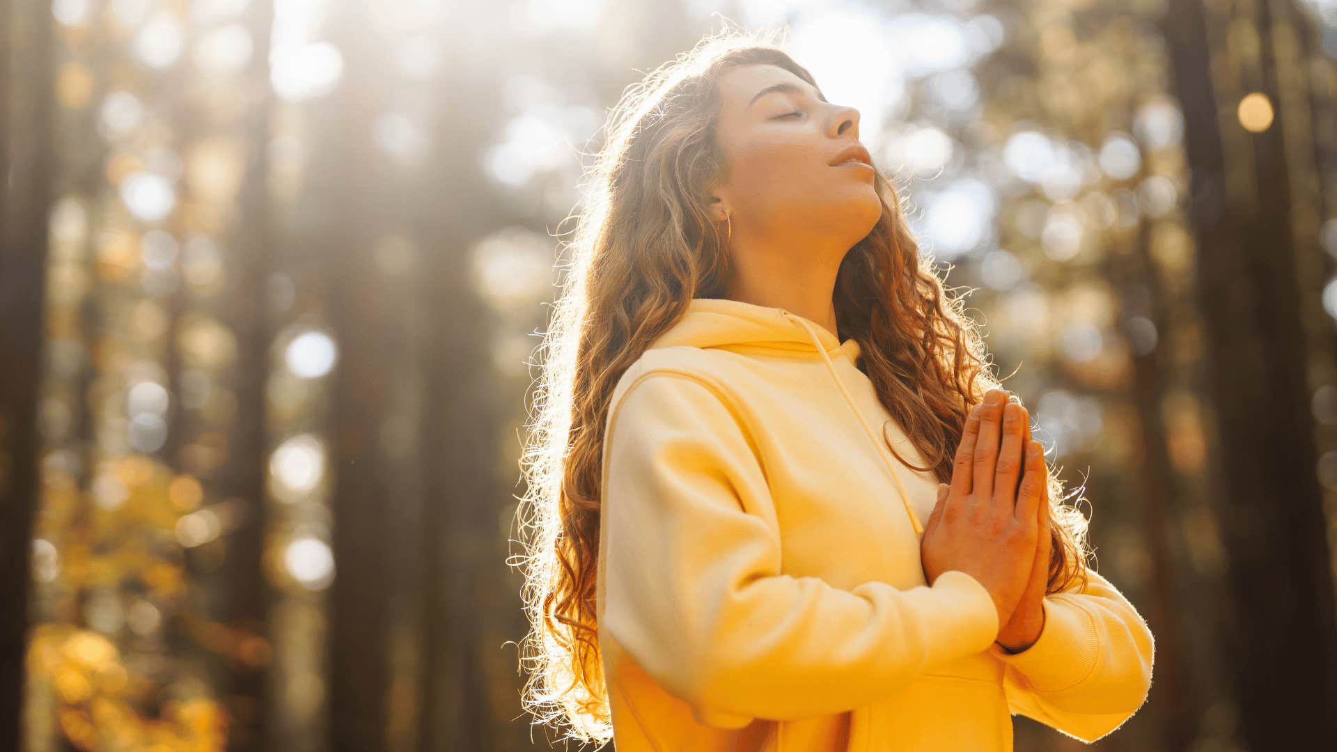 woman doing yoga outside