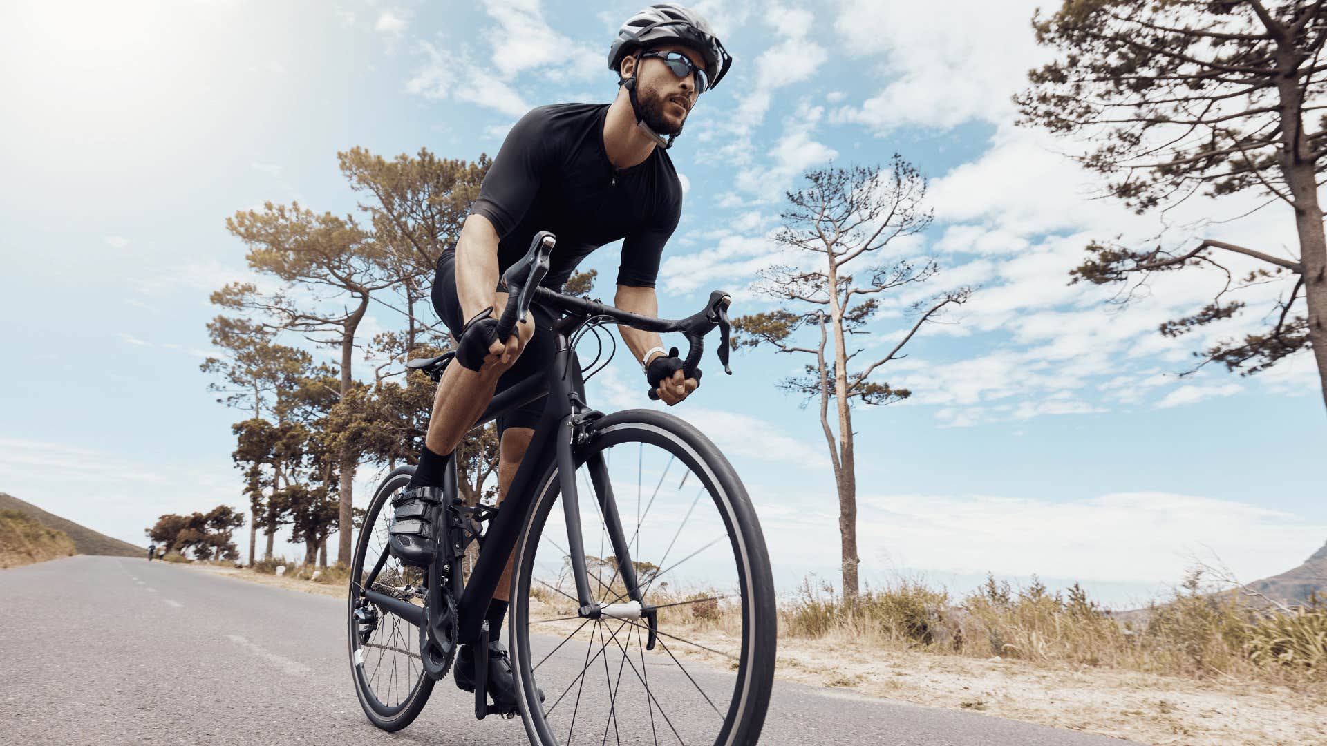 man who sticks with riding his bike