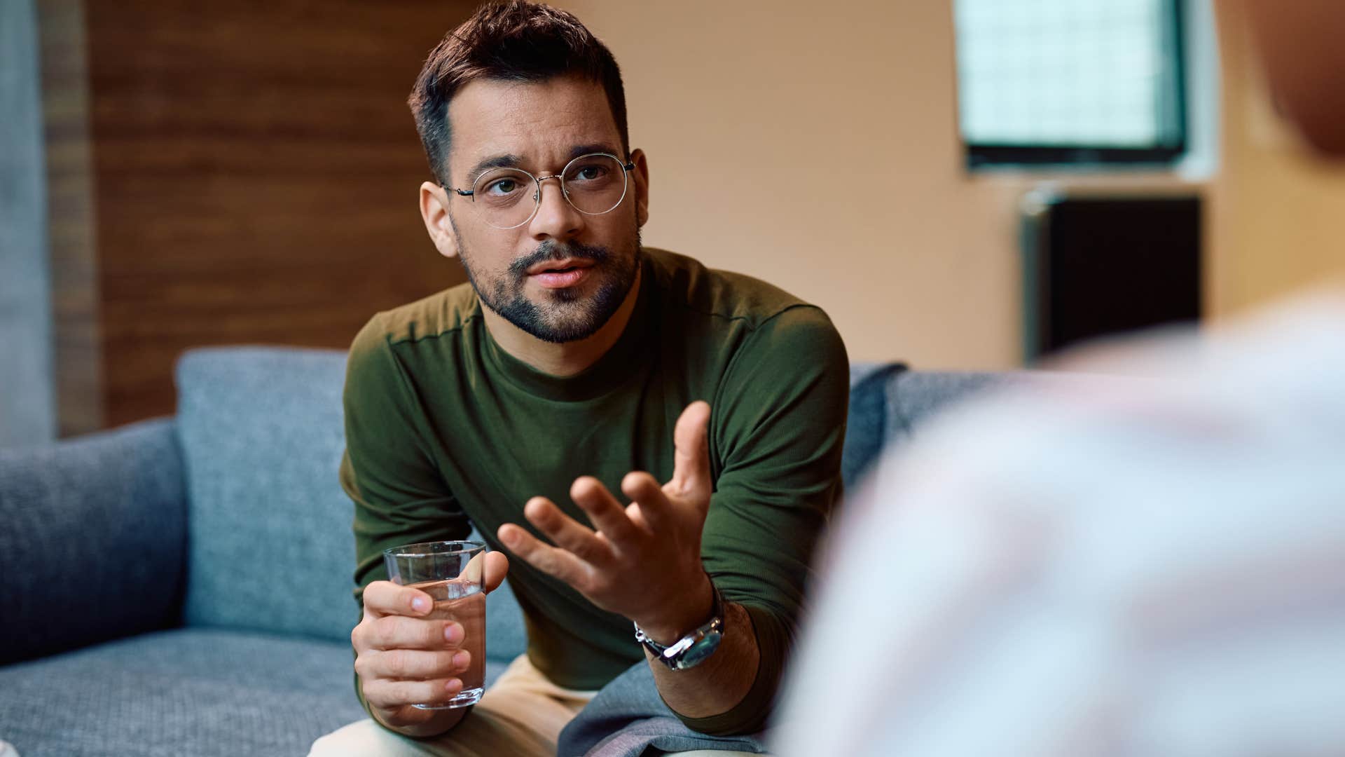 man discussing mental health with therapist