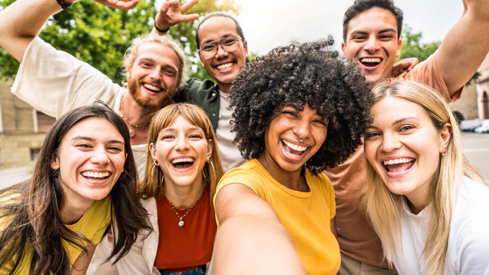 diverse group of millennials smiling