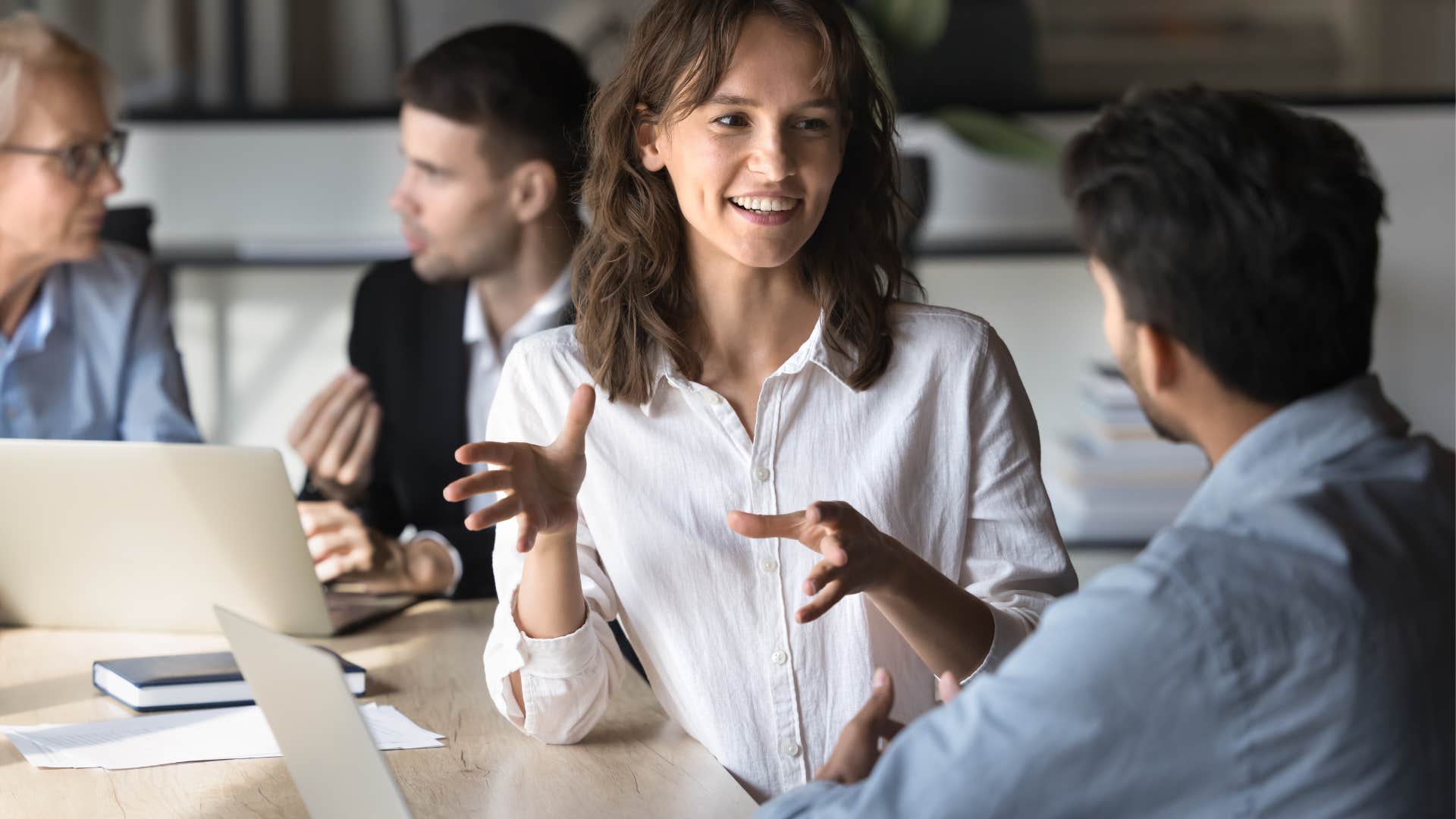 woman tells her coworker that she won’t be able to do something going forward