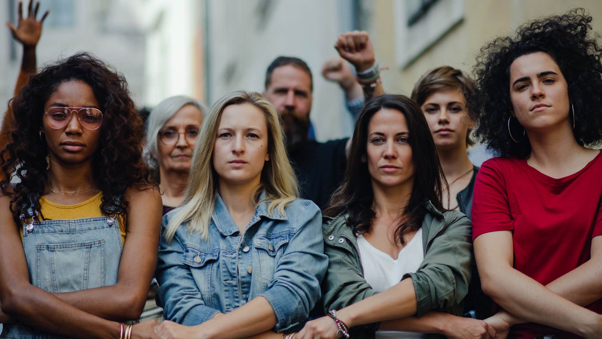 group of gen z people engaging in subtle yet powerful activism on the street