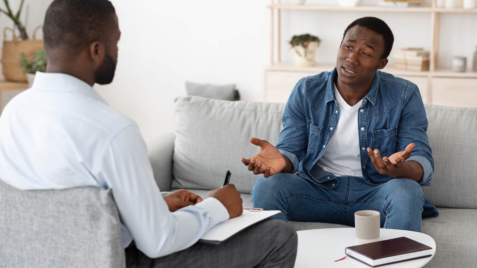 black gen z man talking to therapist normalizing mental health conversations