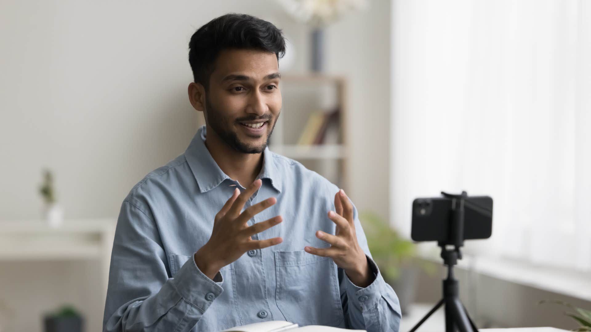 gen z man talking to camera and filming video forging new career paths