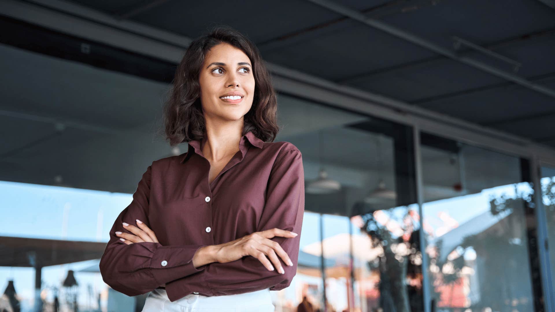 confident businesswoman with her arms crossed