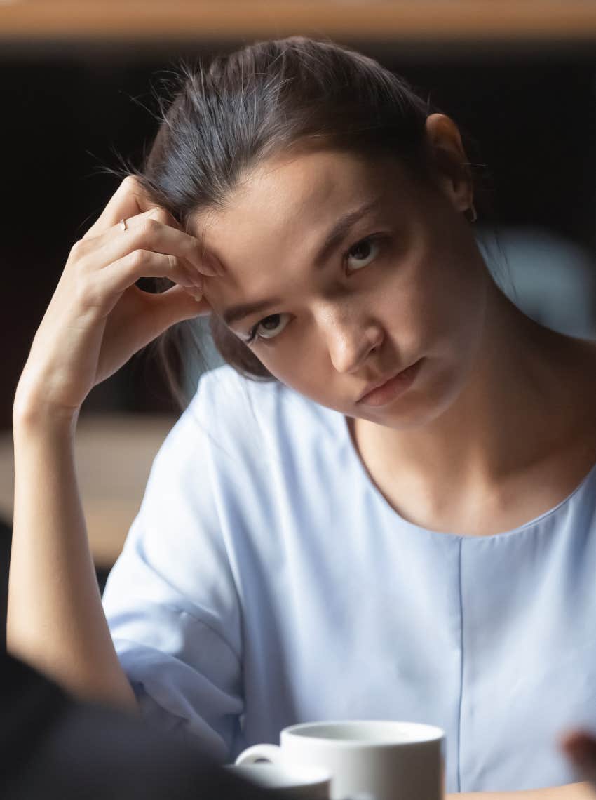 Woman annoyed at being interrupted 