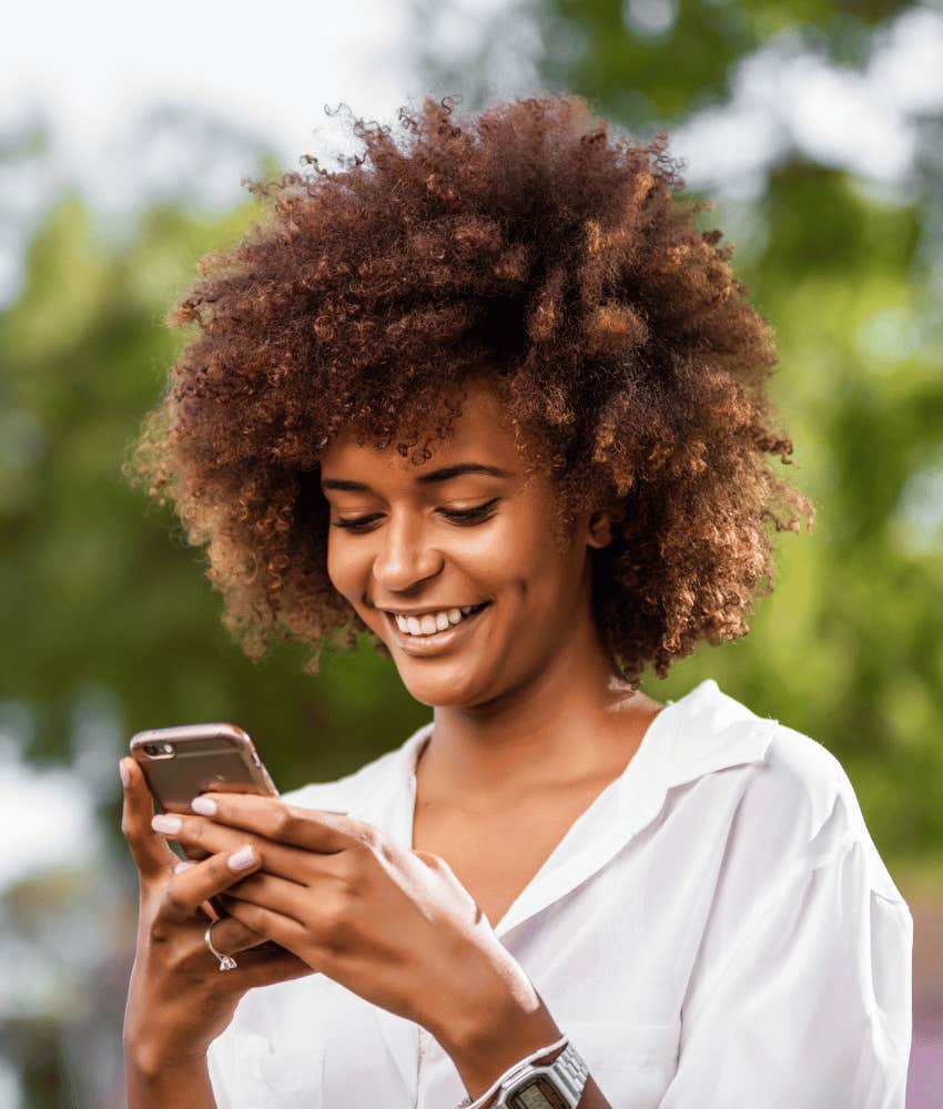 young woman who is more self-aware than boomers texting