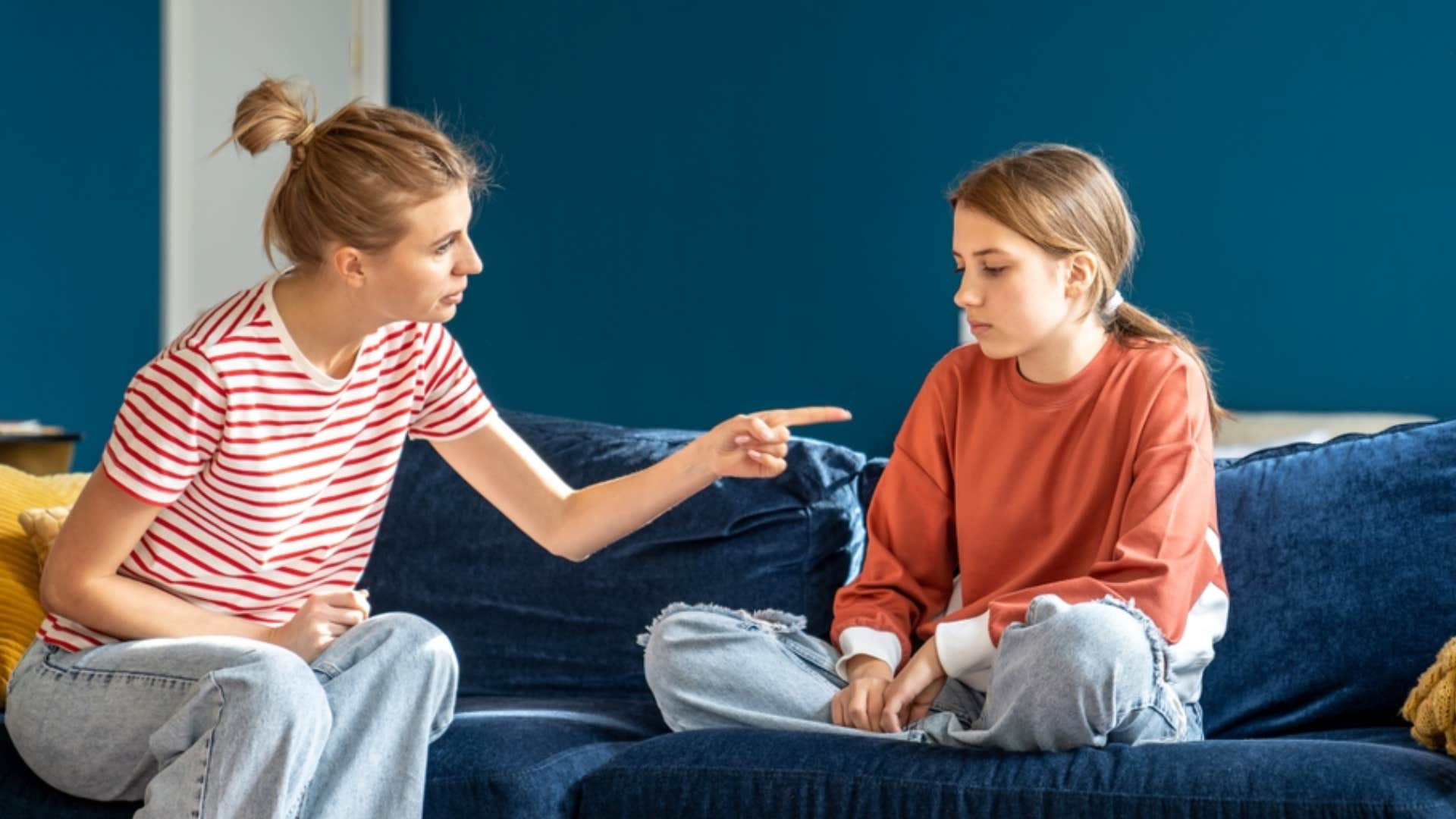 mom telling daughter spare the rod spoil the child 