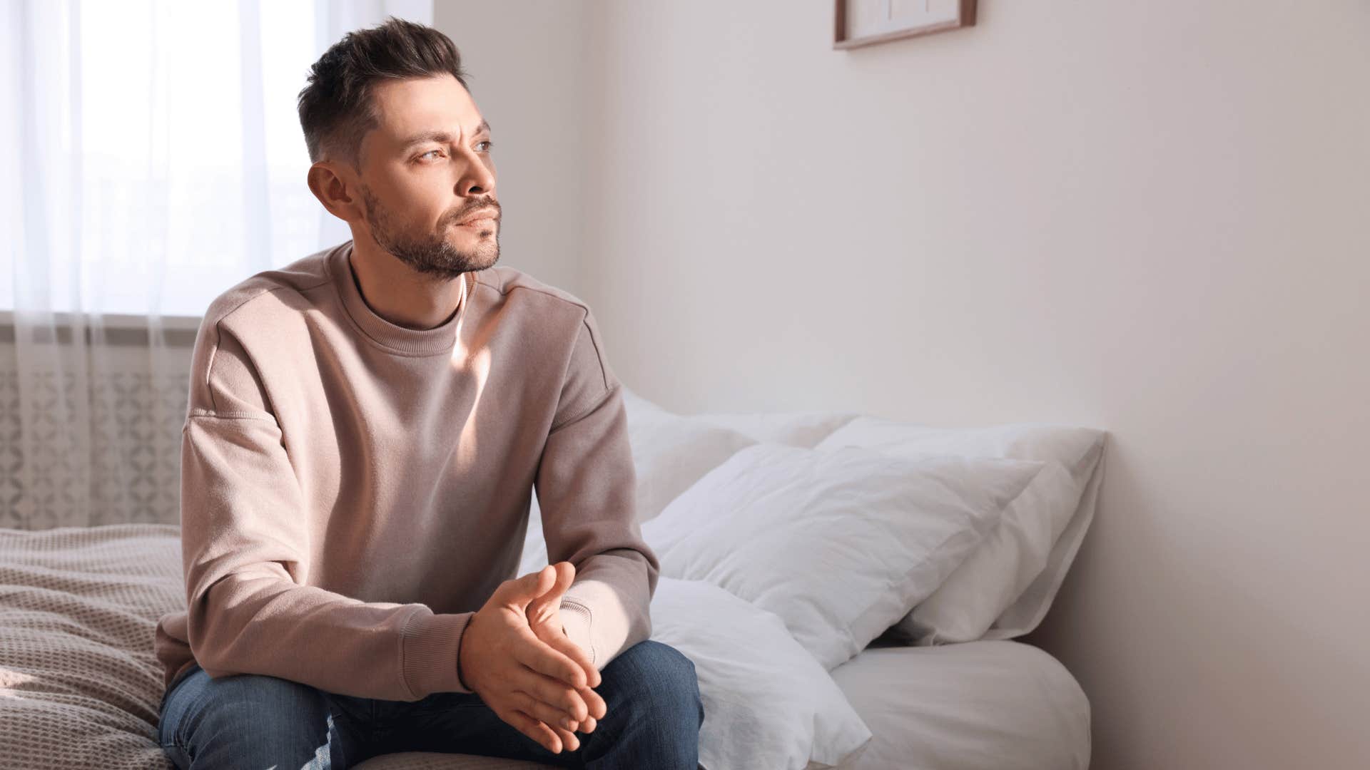 man sitting comfortably with uncertainty