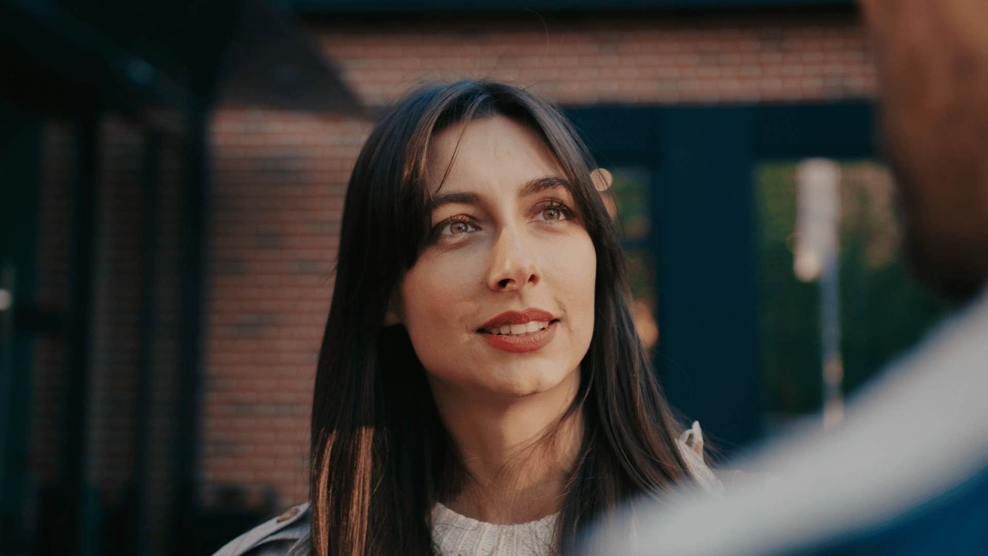 woman chatting with friend calmly