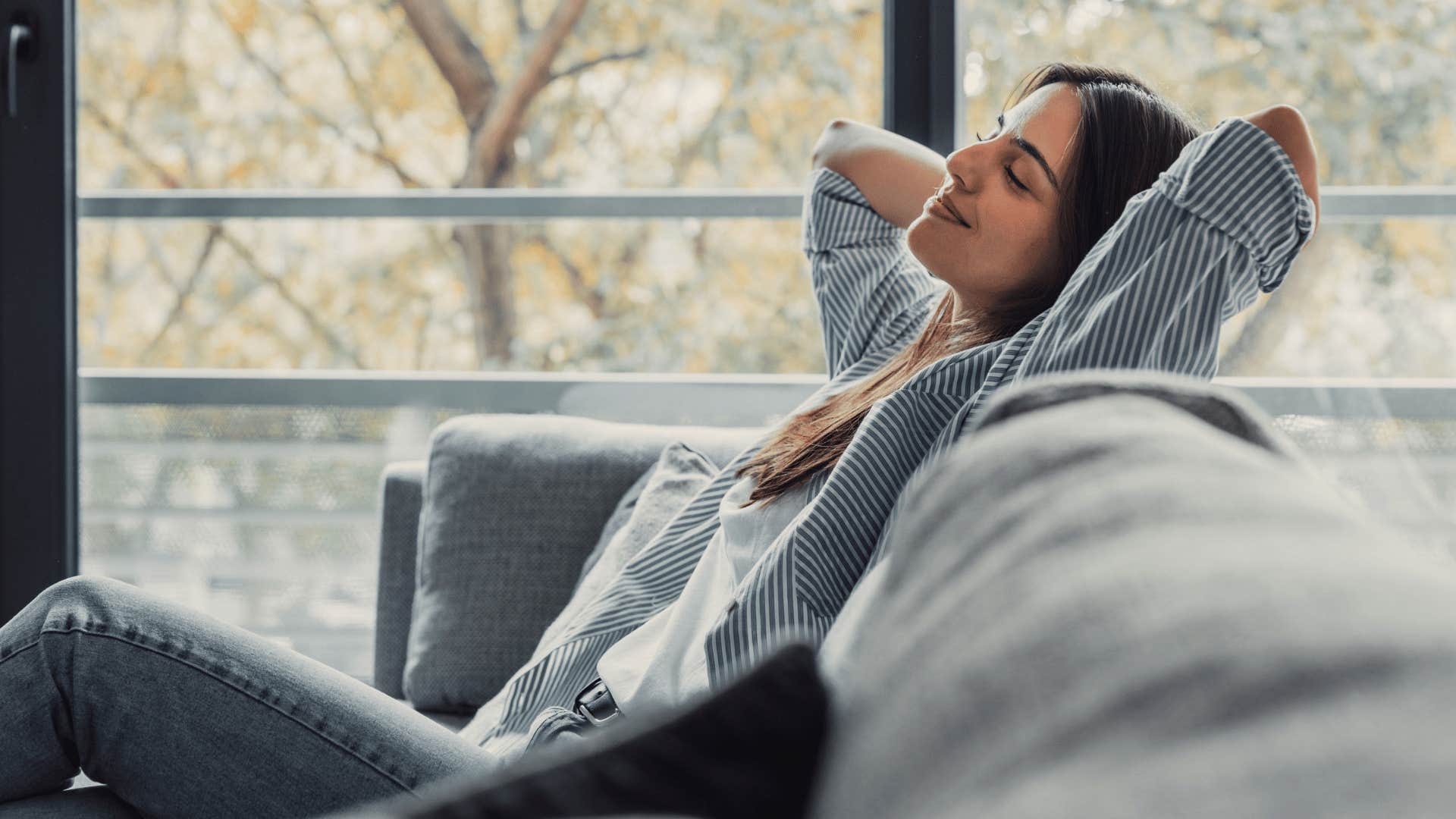 happy woman sitting alone