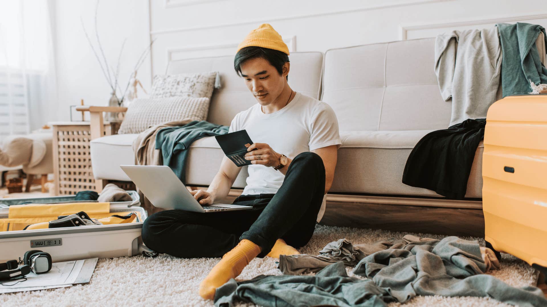 man excited as he makes a mess in his living room