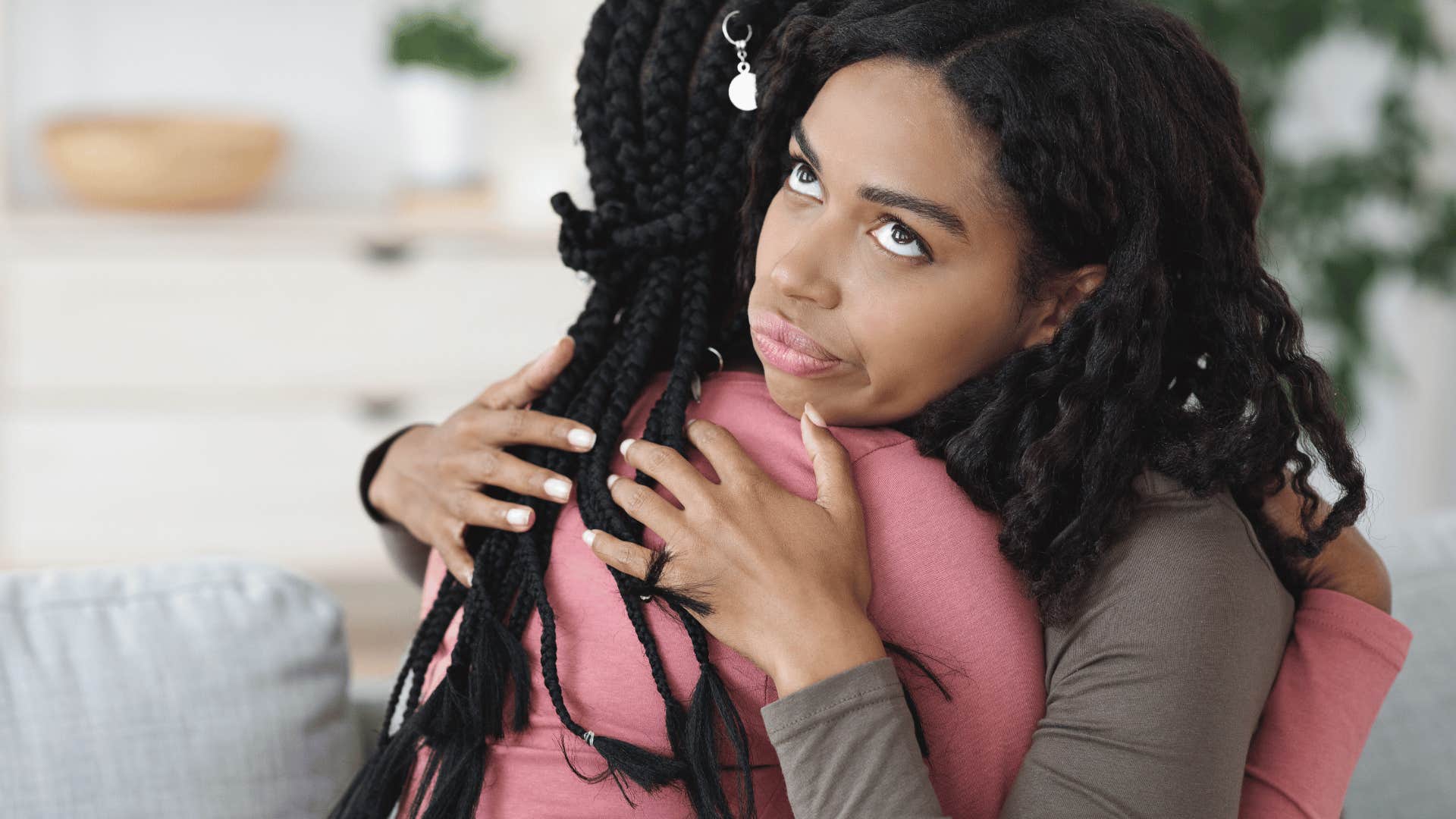 woman hugging a fake friend