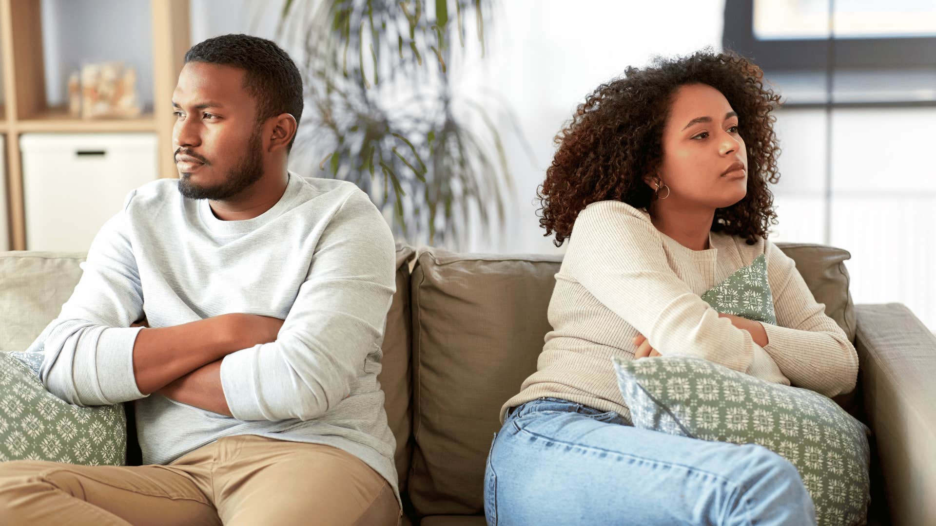 unhappy couple settling