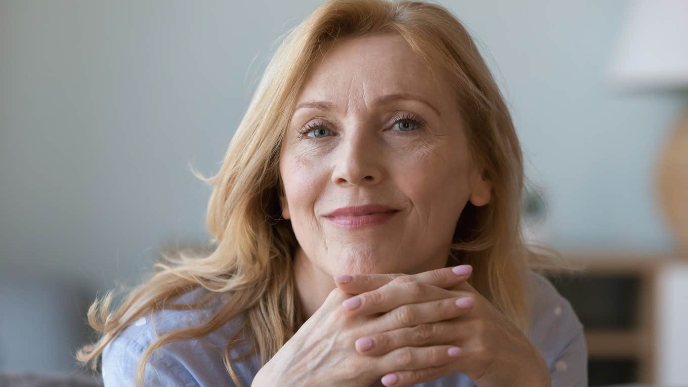 Reasons People Who Choose Peace Over Popularity As They Get Older Usually Have older woman smiling choosing peace over popularity