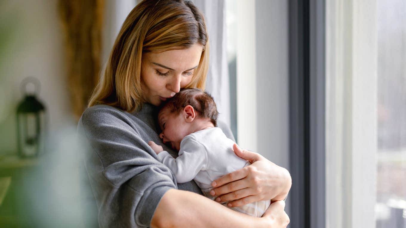 Boyfriend Tells New Mom She Took The Easy Way Out By Having A C-Section new mom holding newborn baby