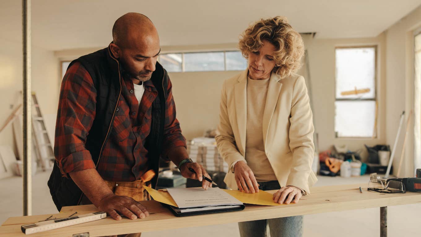 Mom Renovates House With New Gym Instead Of Separate Bedrooms Kids Mom reviewing plans to renovate house with a new gym instead of giving kids their own rooms
