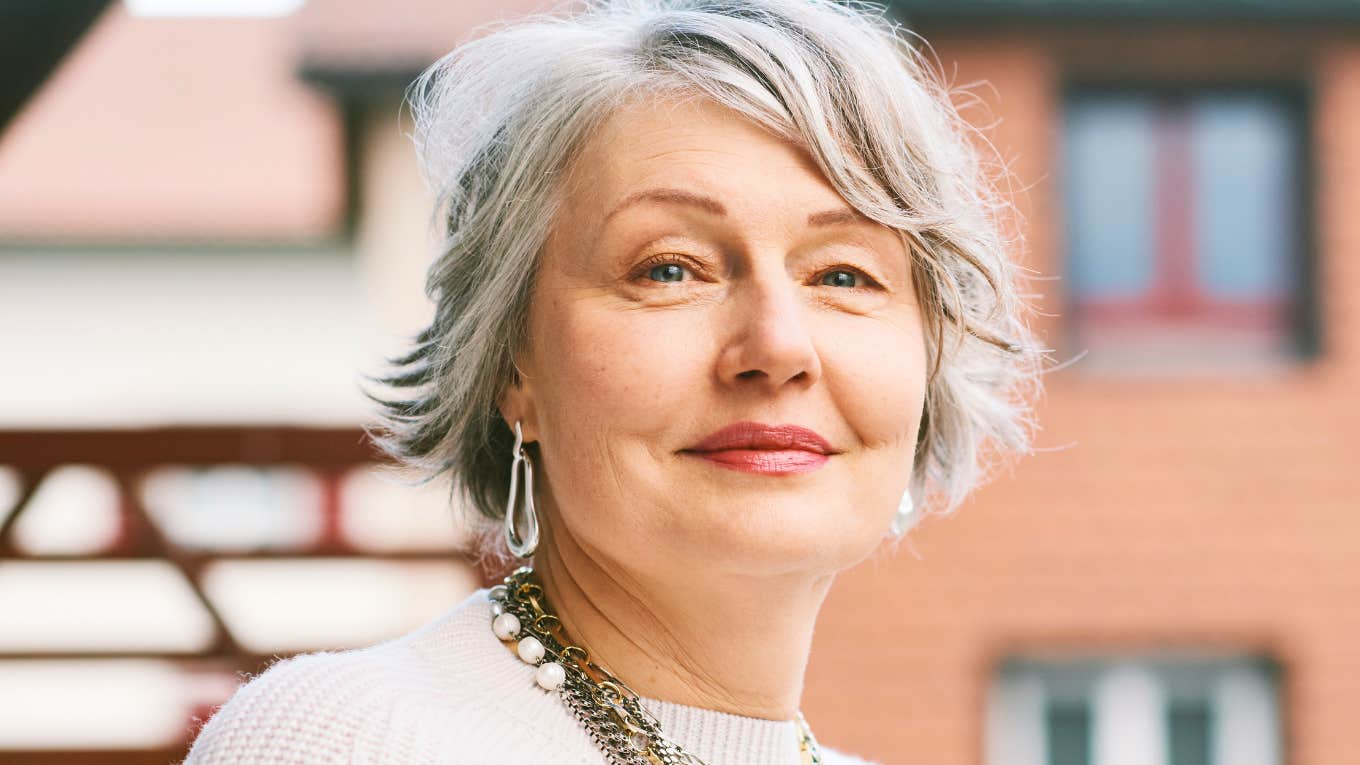 Things People With High IQs Stop Liking The Older They Get, According To Research older intelligent woman with a high iq smiling