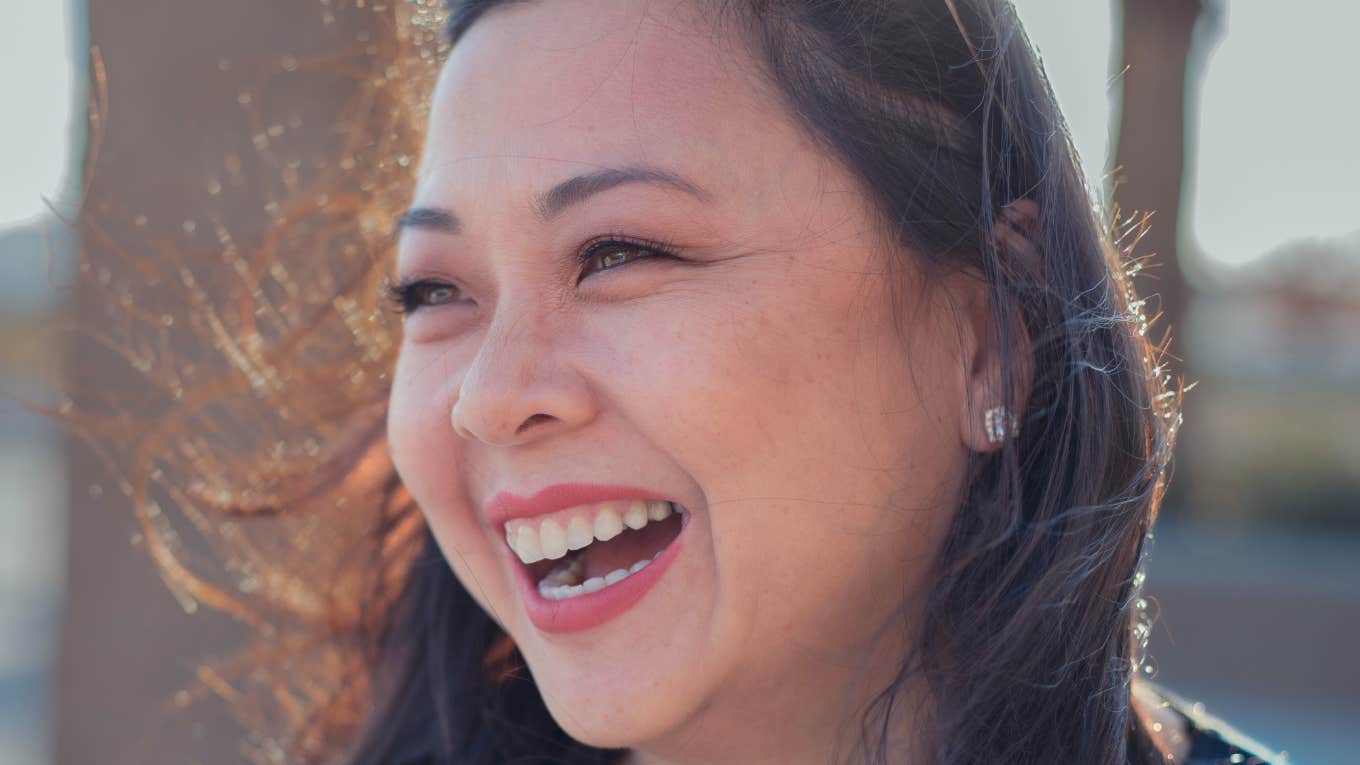 Timeless Rules That Make Life Feel Rich, No Matter How Much You Have Woman feels rich in life.