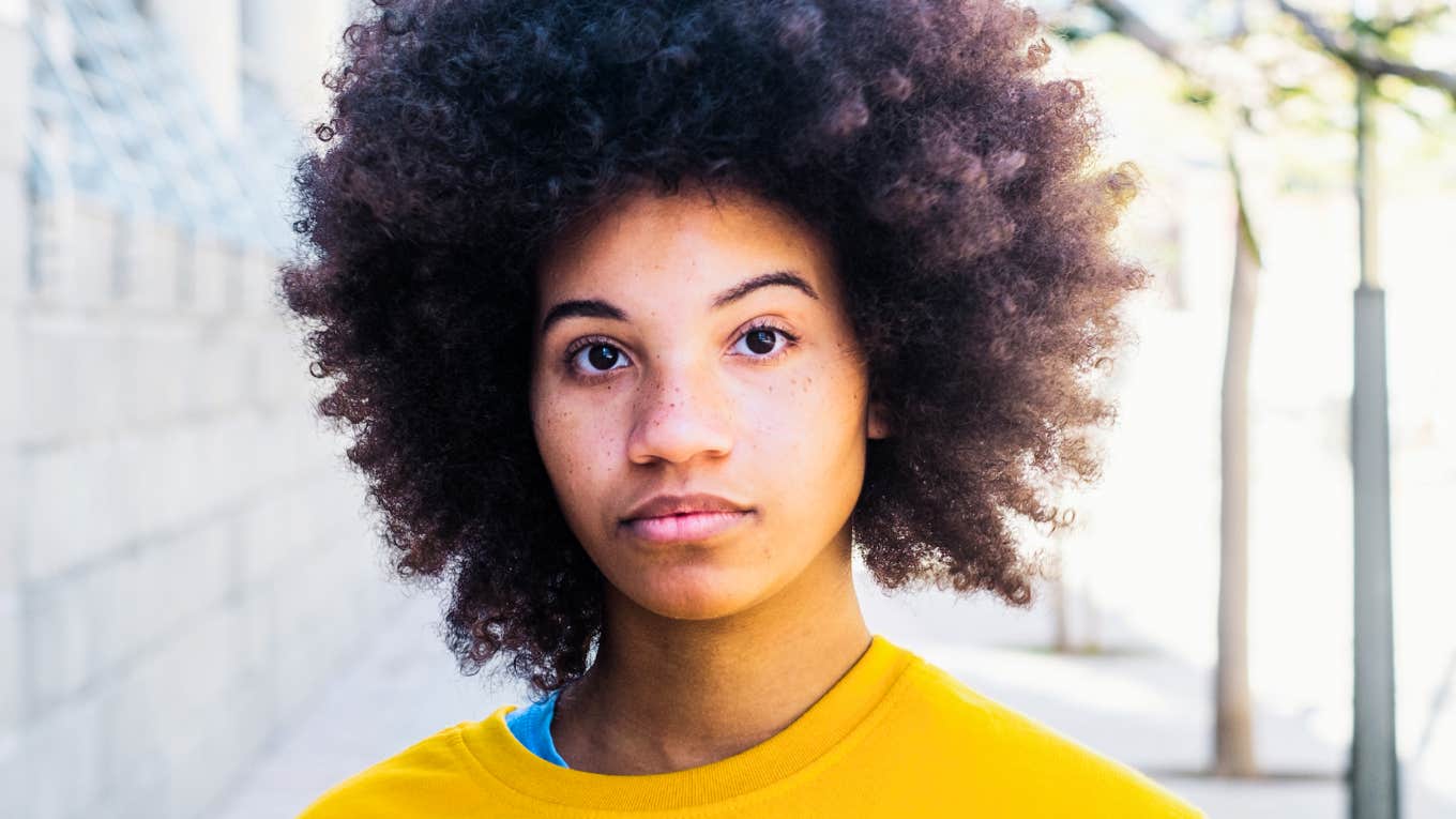 Motivational Myths That Sound Smart — But Secretly Make You Less Productive, According To Psychology Woman who is secretly less productive.