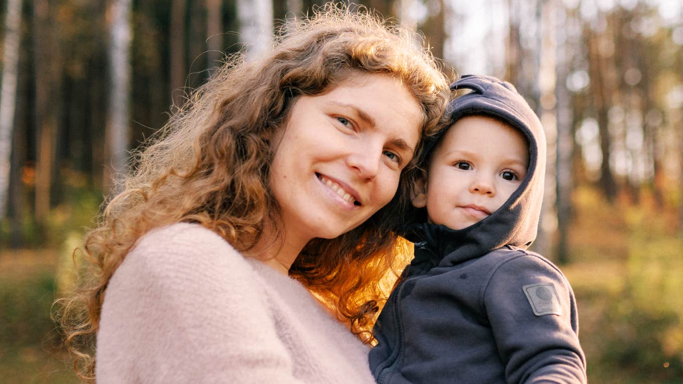 TK Surprising Reasons Single Moms Thrive More Than Married Moms, According To Research Single mom thriving more than a married mom.