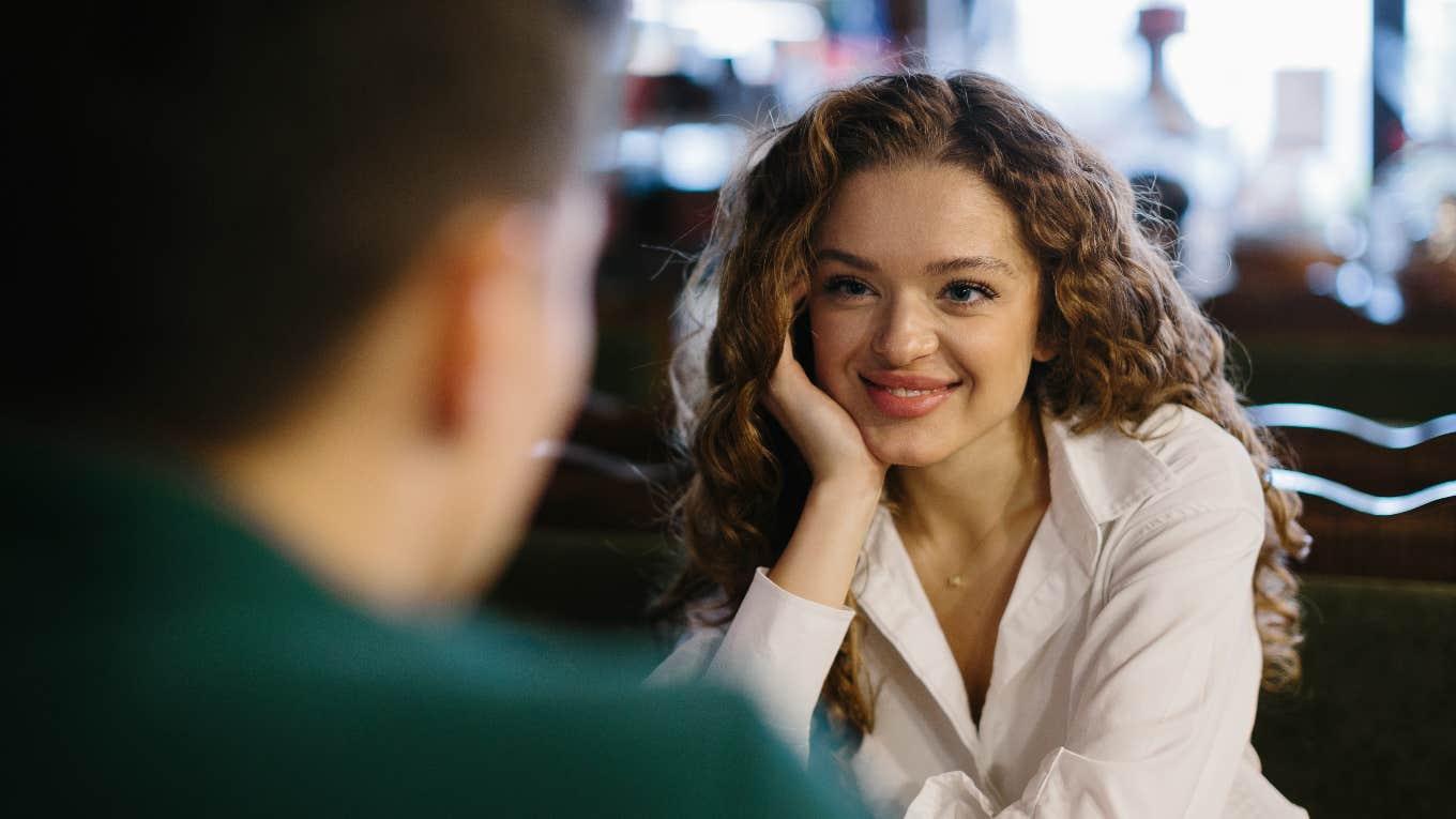 A Woman's Answer To This First Date Question Reveals What Your Relationship Will Be Like woman answering a first date question that reveals what the relationship will be like