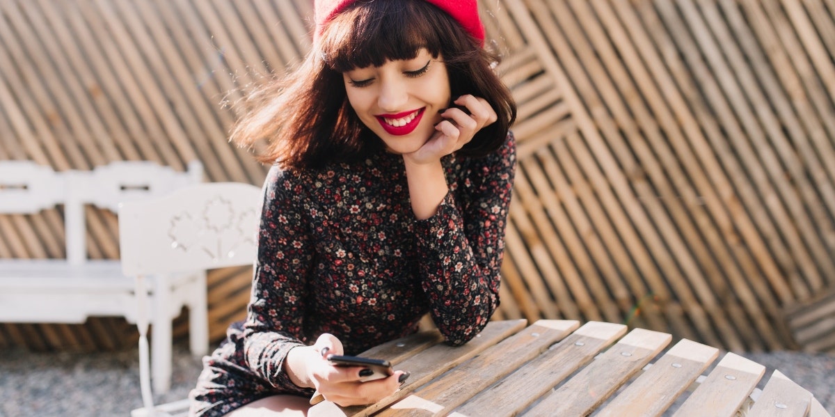 woman looking at phone