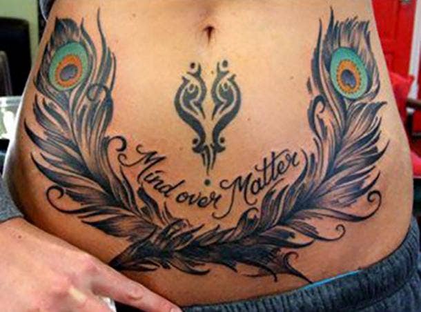 Peacock Feather Tattoo On Rib - Tattoos Designs