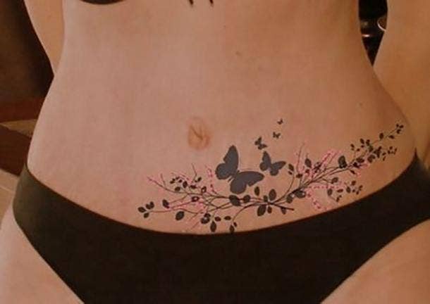 stomach tattoo over stretch marksTikTok Search