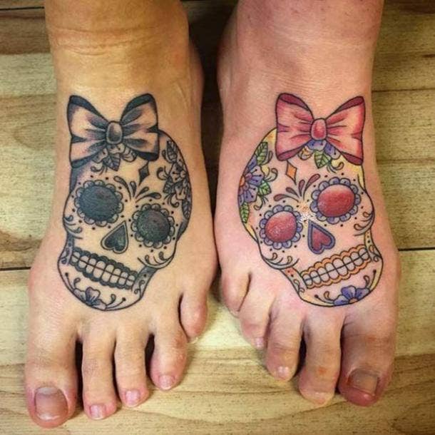 Matching skull tattoos for a couple  Tattoogridnet